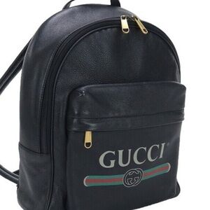 Gucci Black Leather Backpack with Gold Accents